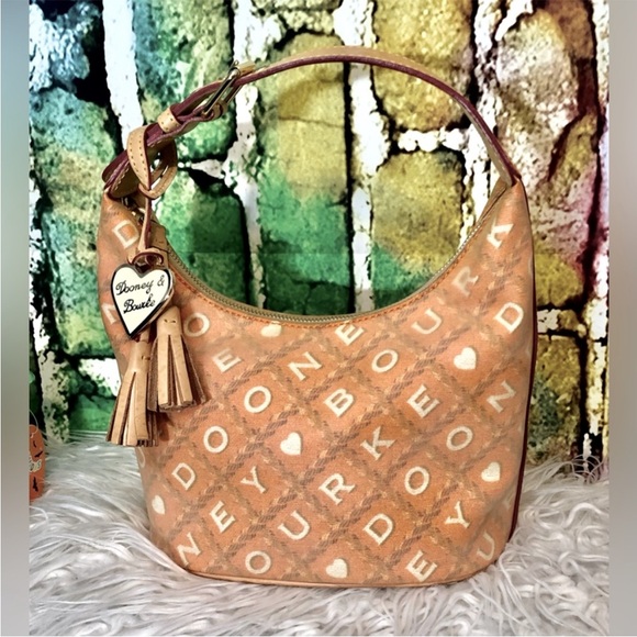 Dooney & Bourke Handbags - Dooney & Bourke Vintage Coral Peach Crossword Bucket Purse Shoulder Bag EUC